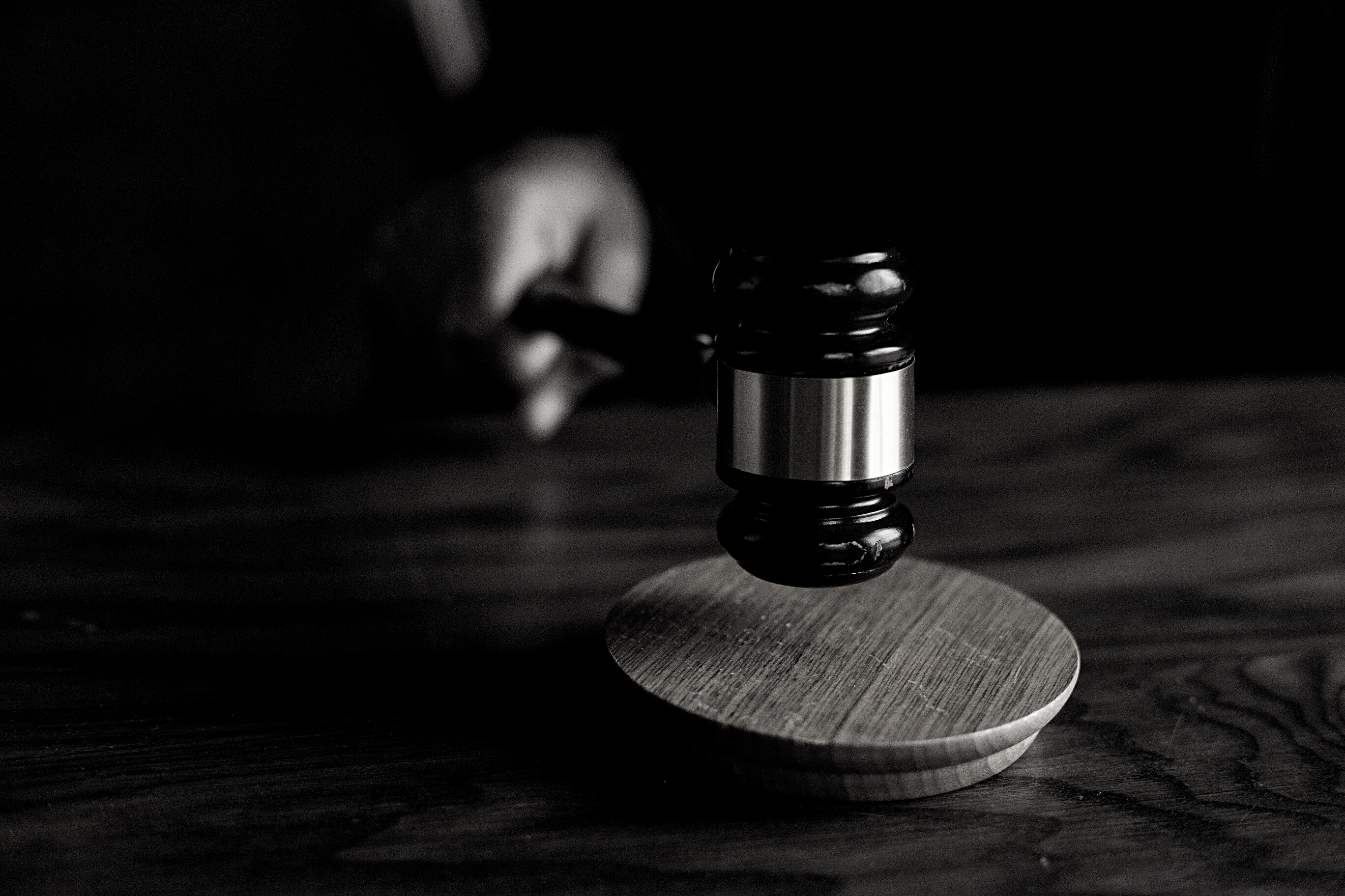 Brown Wooden Gavel on Brown Wooden Table
